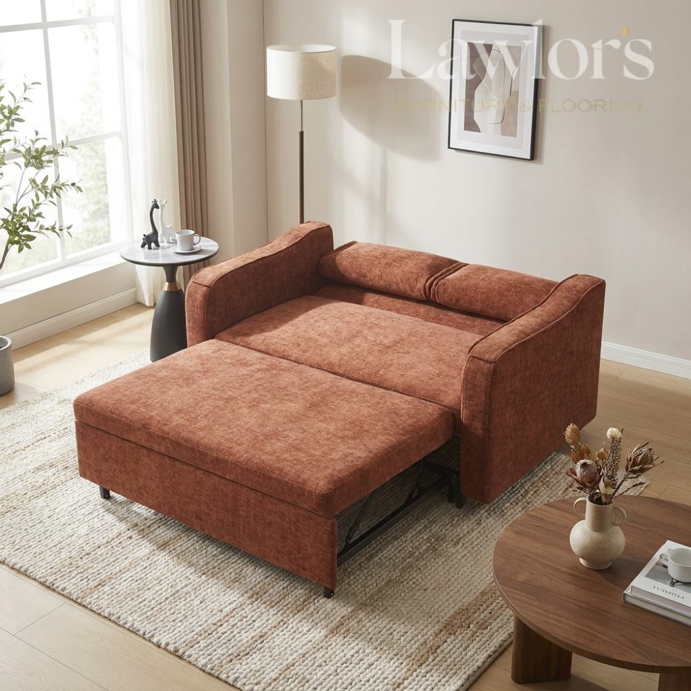 Red open sofa bed in a living room