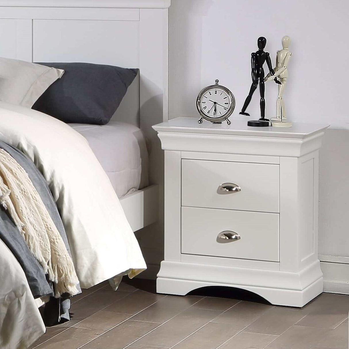 The Bella Bedside Locker features solid pine, white lacquer finish, elegant design with ample storage.