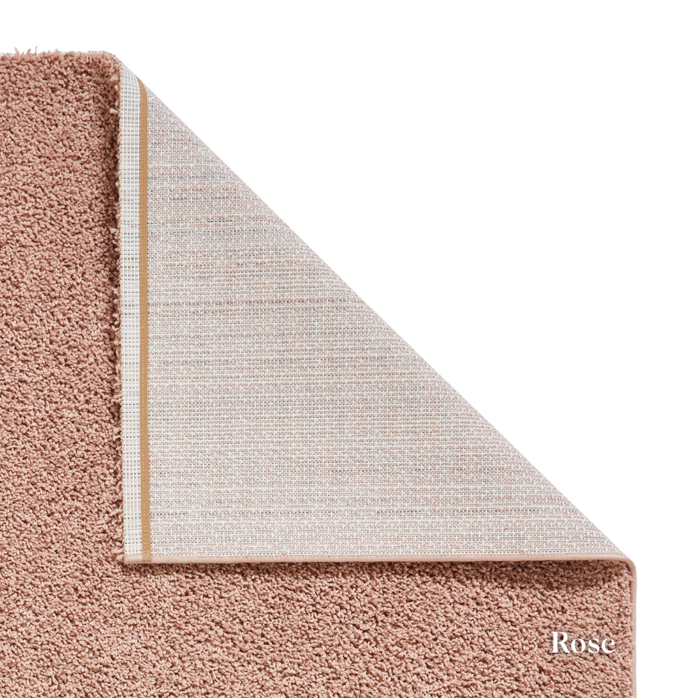 Add freshness with the eco-friendly Bali Plain Shaggy Machine Made Rugs range with 100% recycled polyester, ultra soft pile & durable machine made design.