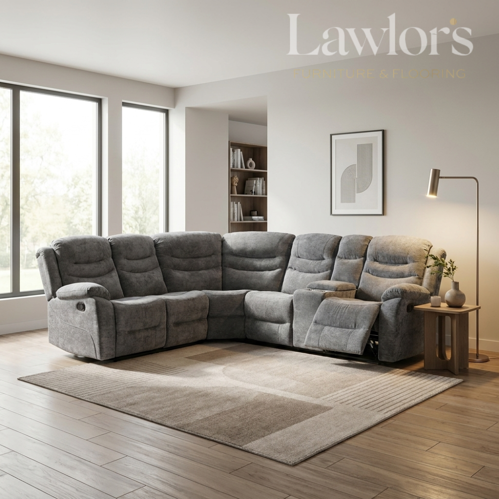 A gray fabric sectional corner recliner sofa in a modern living room setting.