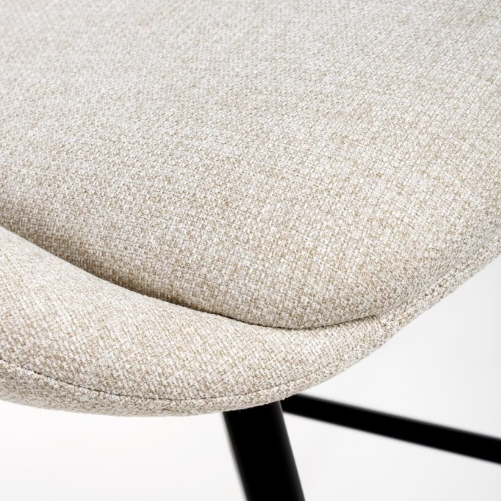 The Boden Bar Chair in Sage Green, Natural or Brick offers luxurious fabric comfort, chic pleated details, robust black metal legs