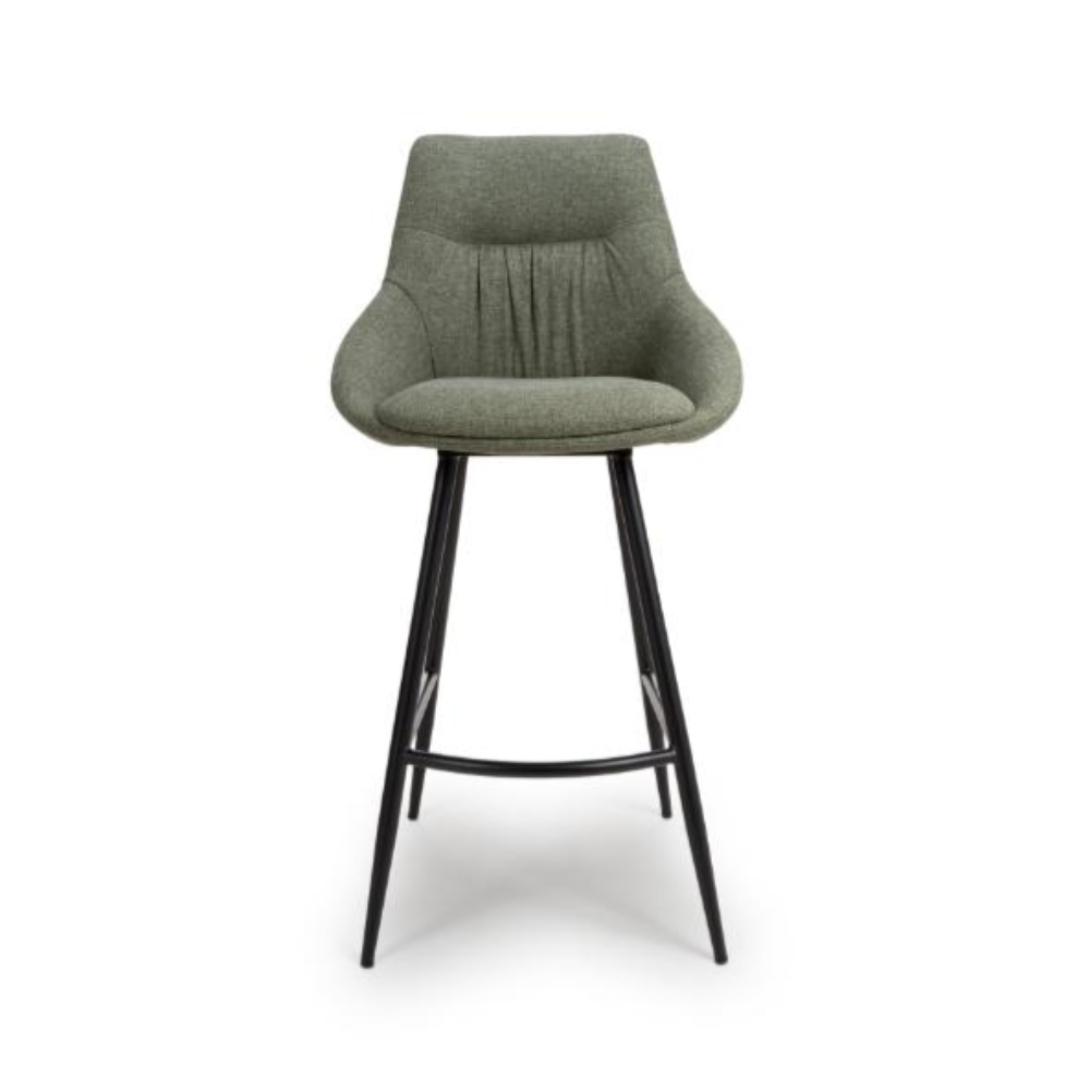 The Boden Bar Chair in Sage Green offers luxurious fabric comfort, chic pleated details, robust black metal legs