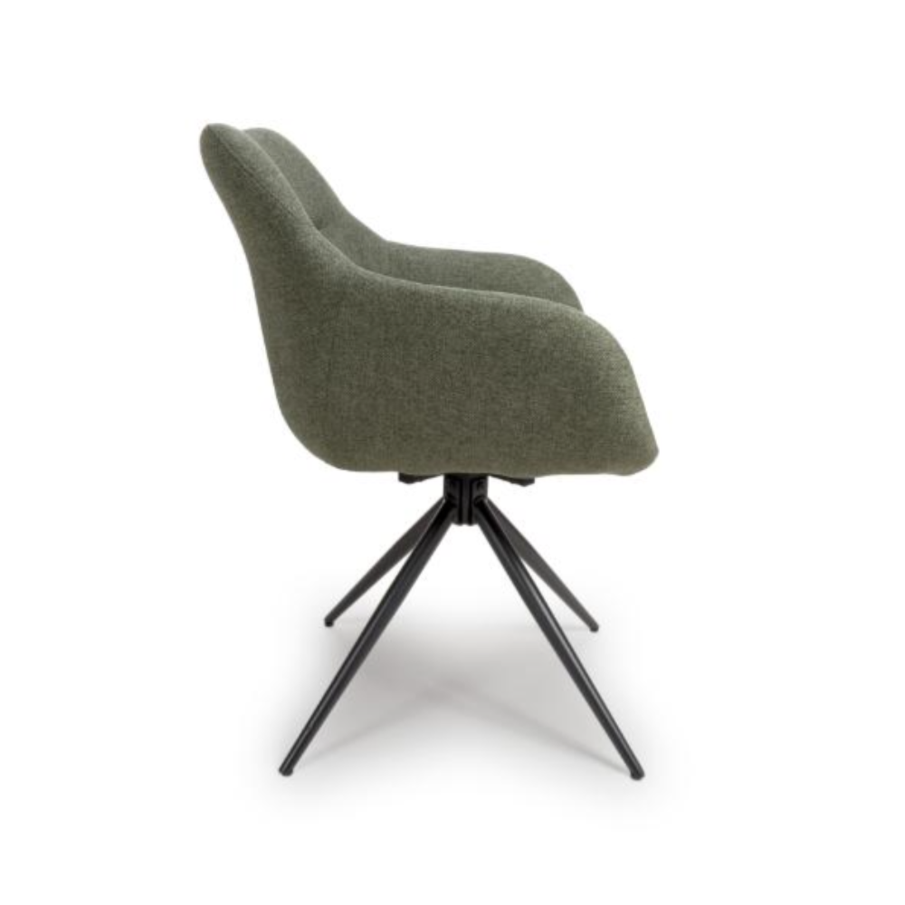 The Boden Carver Chair in Sage Green blends modern style with comfort, plush fabric upholstery, sleek metal legs