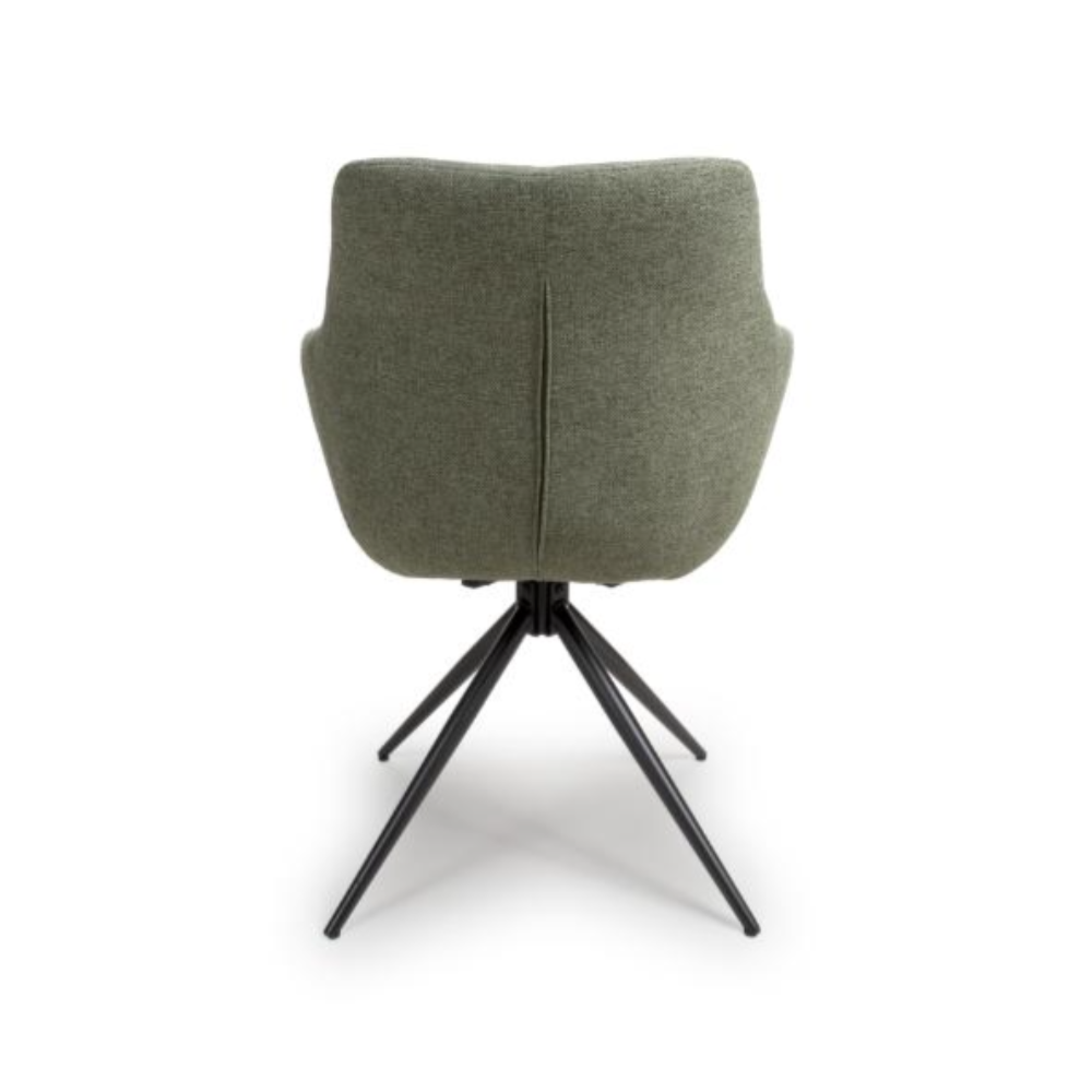 The Boden Carver Chair in Sage Green blends modern style with comfort, plush fabric upholstery, sleek metal legs