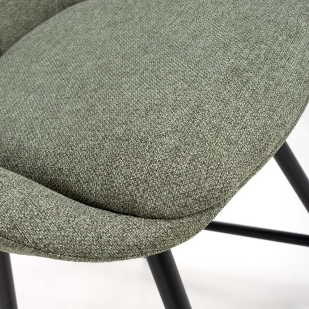 The Boden Counter Chair in Natural, Sage Green and Brick features soft upholstery, sophisticated pleats and strong black metal legs