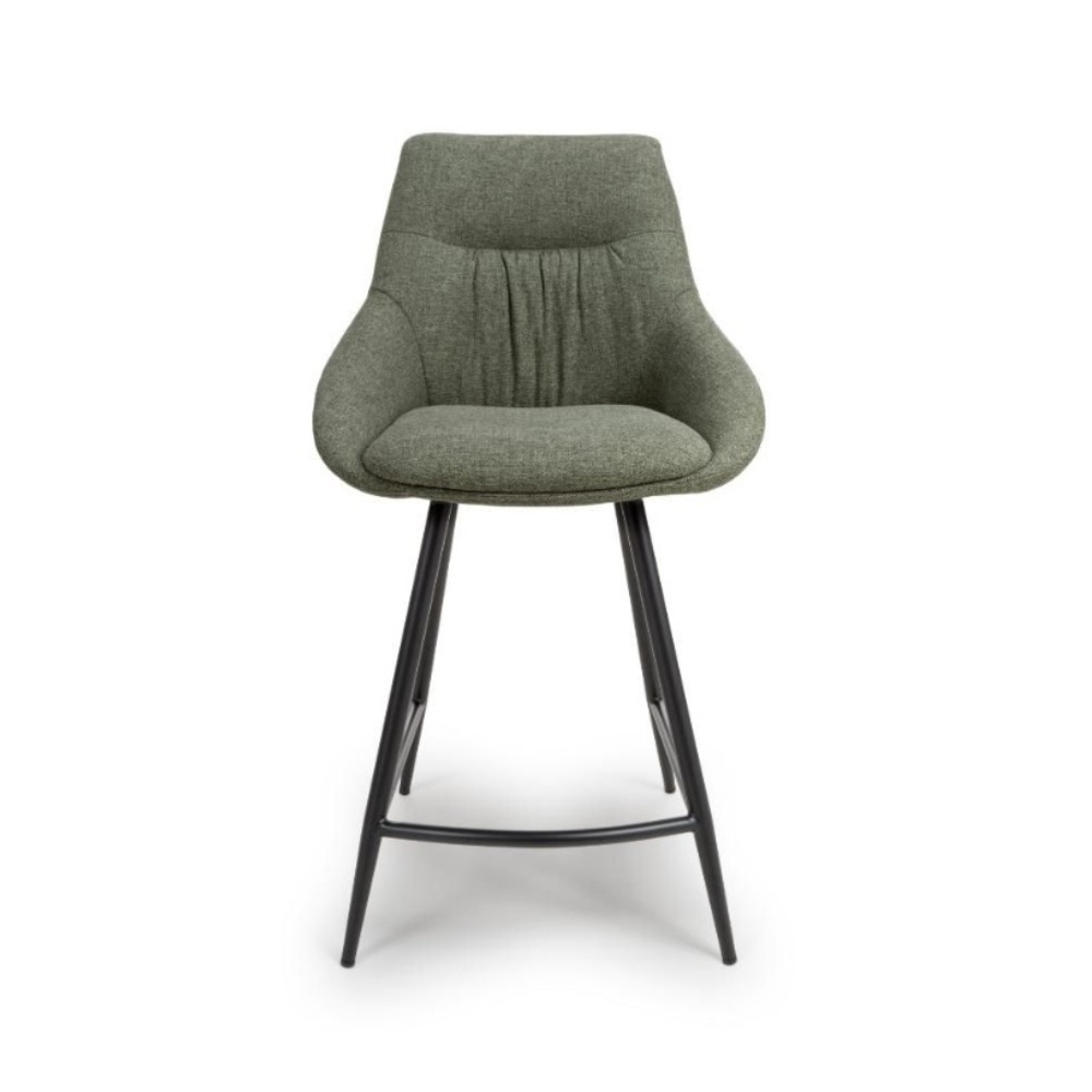 The Boden Counter Chair in Natural, Sage Green and Brick features soft upholstery, sophisticated pleats and strong black metal legs