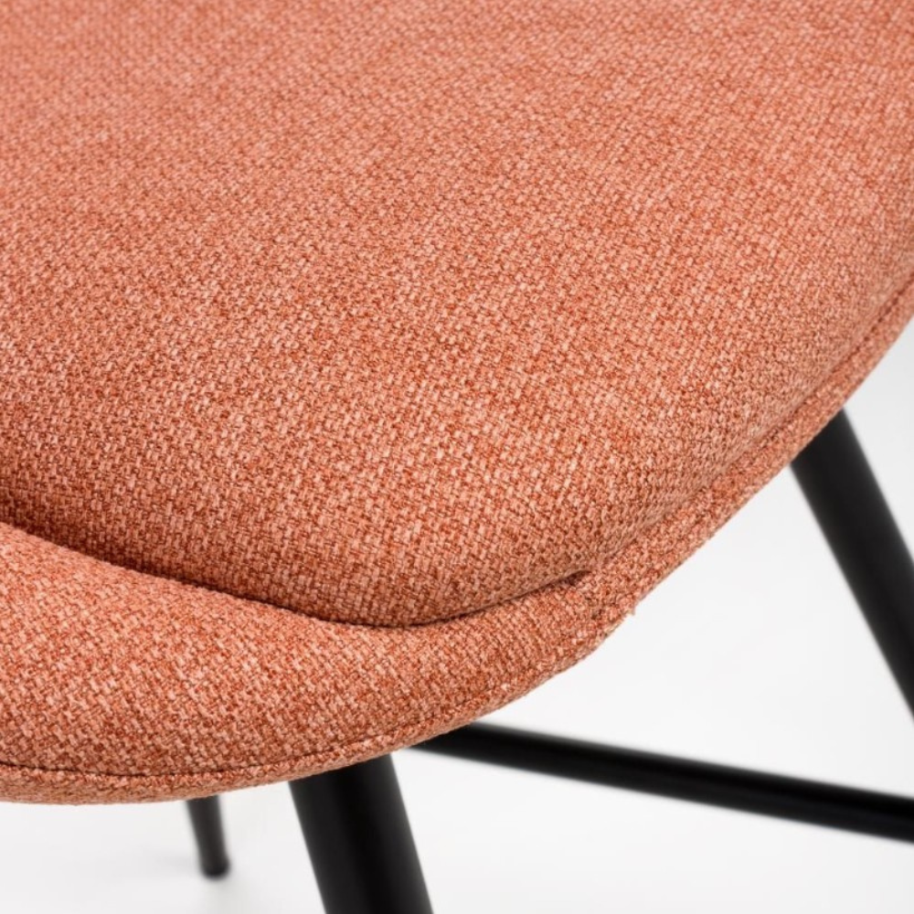 The Boden Counter Chair in Natural, Sage Green and Brick features soft upholstery, sophisticated pleats and strong black metal legs