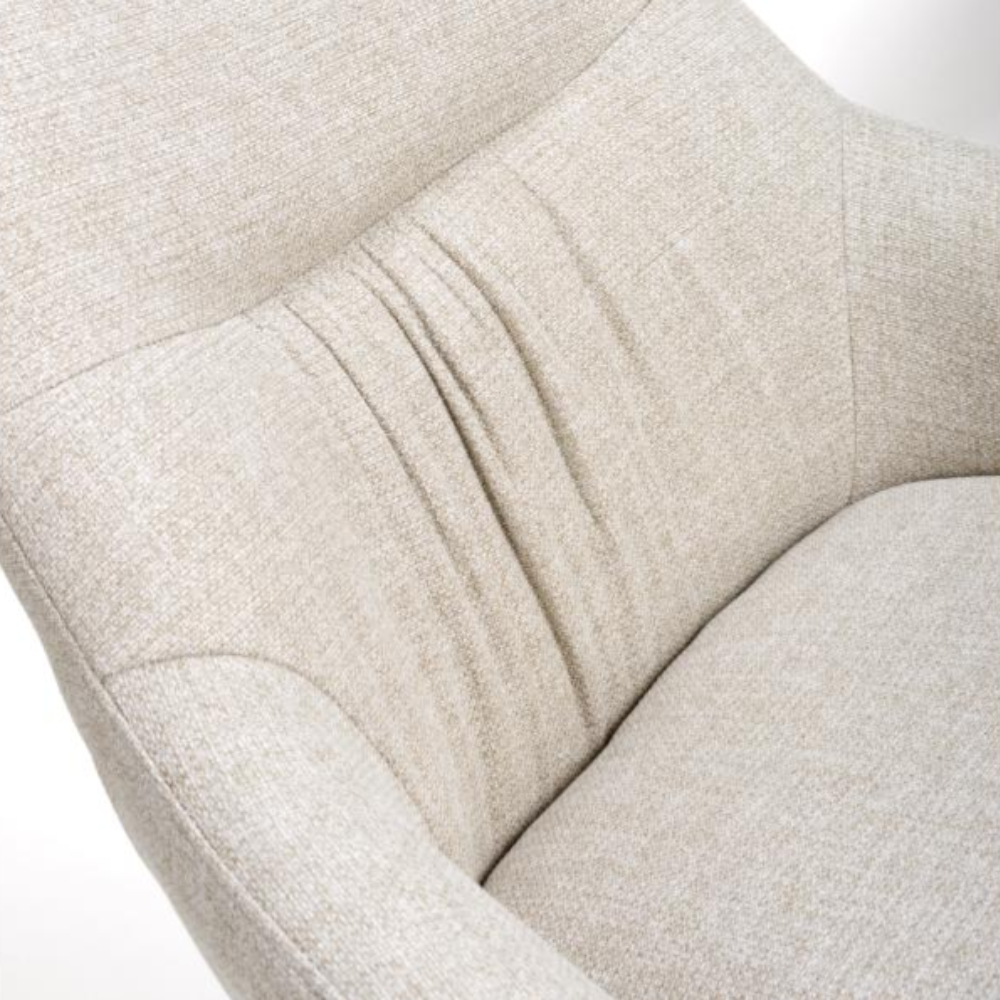 The Boden Counter Chair in Natural features soft upholstery, sophisticated pleats and strong black metal legs