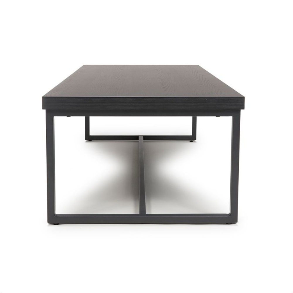 The Boston Coffee Table in Black Ash boasts a SmarTops® surface, robust iron legs and a generous design, making it as a practical and elegant addition.