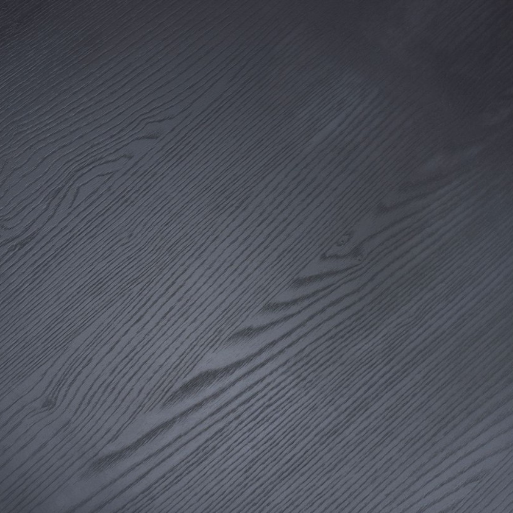 The Boston Coffee Table in Black Ash boasts a SmarTops® surface, robust iron legs and a generous design, making it as a practical and elegant addition.