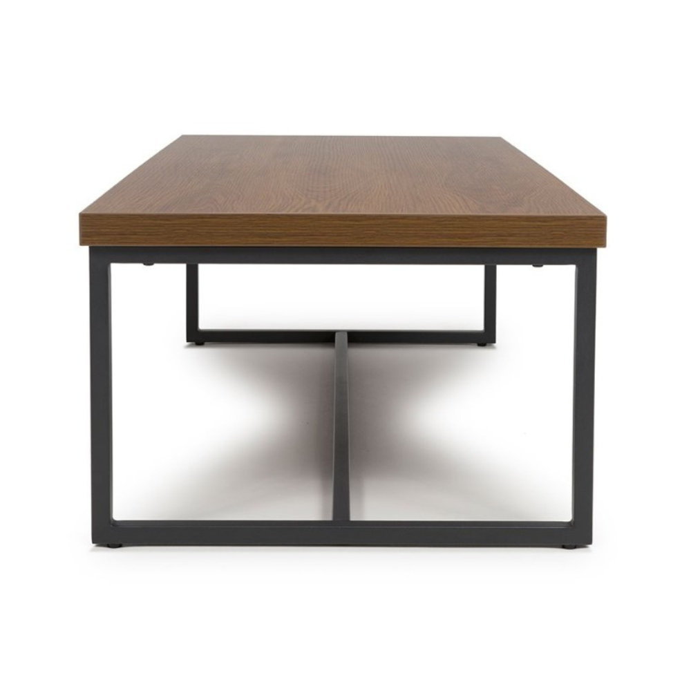 The Boston Coffee Table in Smoked Oak boasts a SmarTops® surface, robust iron legs and a generous design, making it as a practical and elegant addition.