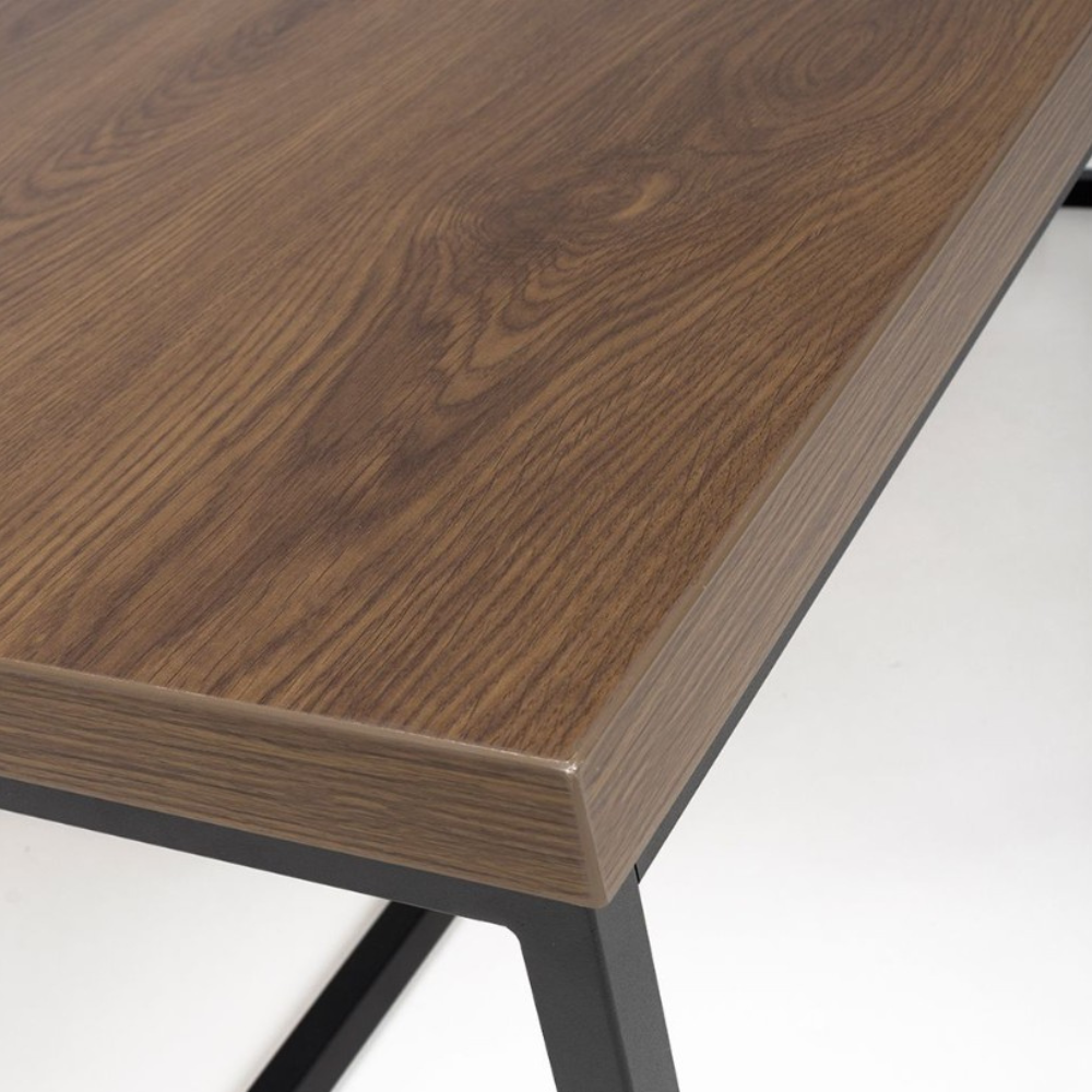 The Boston Coffee Table in Smoked Oak boasts a SmarTops® surface, robust iron legs and a generous design, making it as a practical and elegant addition.