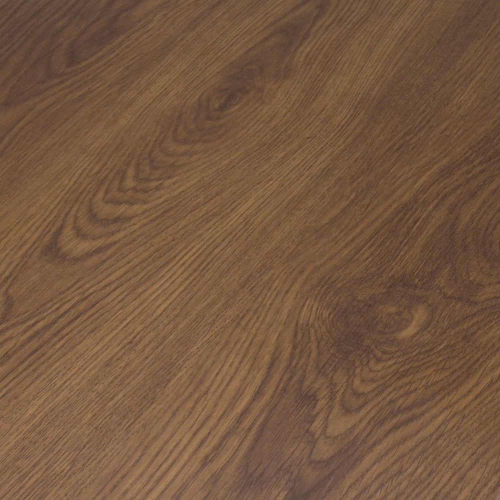 The Boston Coffee Table in Smoked Oak boasts a SmarTops® surface, robust iron legs and a generous design, making it as a practical and elegant addition.