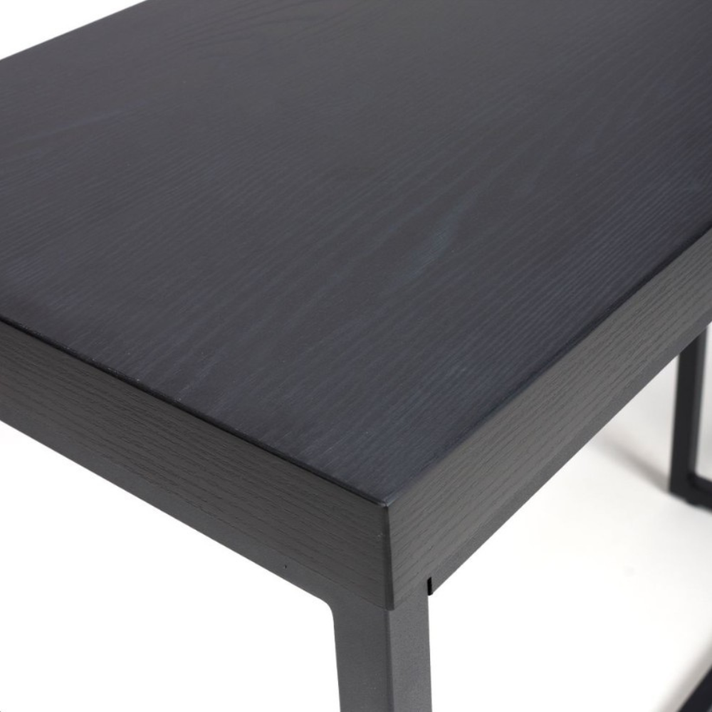 The Boston Console Table in Black Ash features a SmarTops® surface, robust iron legs and a generous design, making it an ideal addition to any setting.