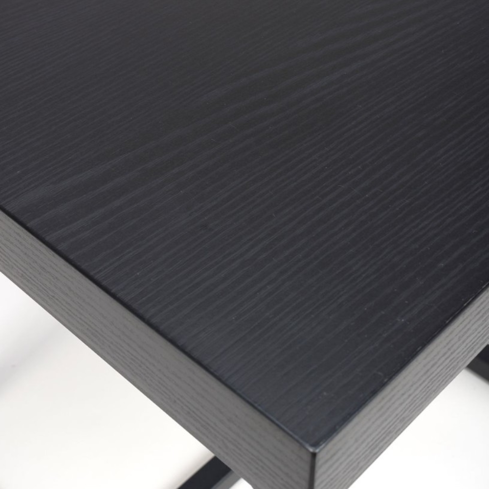 The Boston End Table in Black Ash boasts a robust SmarTops® surface, resilient iron legs and a stylishly compact design, an ideal addition to any setting.