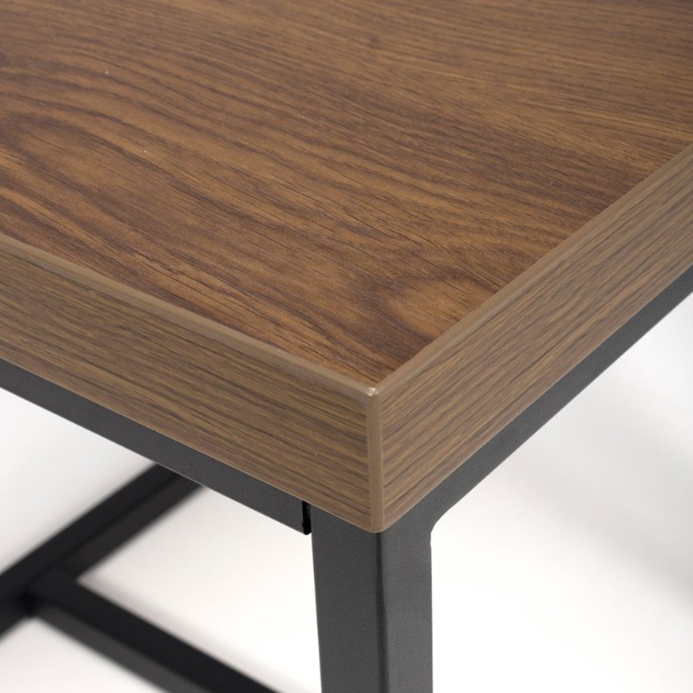 The Boston End Table in Smoked Oak boasts a robust SmarTops® surface, resilient iron legs and a stylishly compact design to compliment any decor.