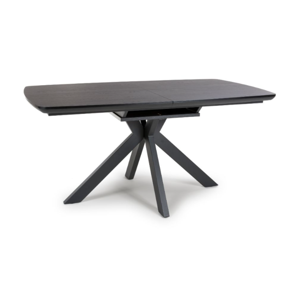 The Boston Extending Table, which ranges from 1600mm to 2000mm, features an elegant veneer, robust black metal legs and a versatile extendable design.