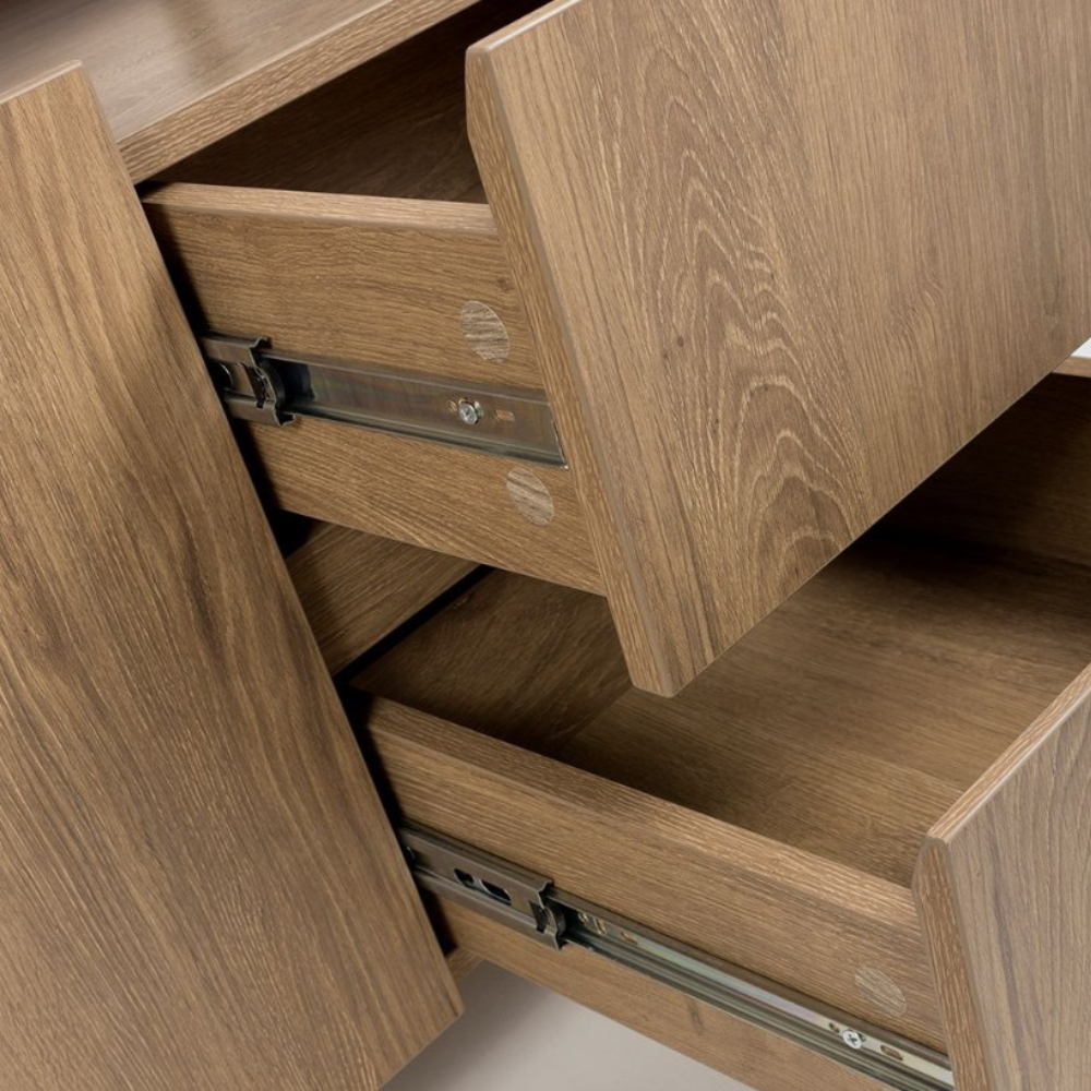 The Boston Sideboard in Rustic Oak showcases a SmarTops® resilient surface, elegant iron legs, and generous storage capacity.