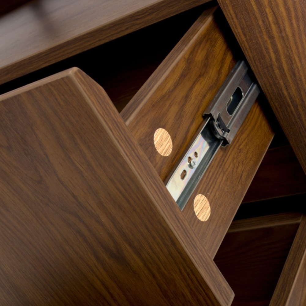 The Boston Sideboard in Smoked Oak features the robust durability of SmarTops®, elegant iron legs and ample storage capacity.