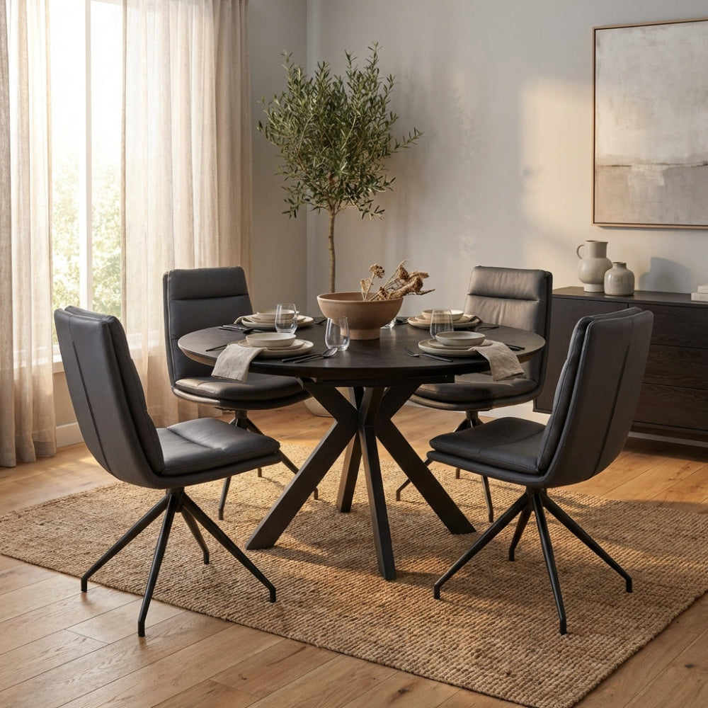 The Boston Extending Table, adjustable from 1200mm to 1600mm, showcases a striking black ash veneer, robust metal legs and a sleek extendable mechanism.