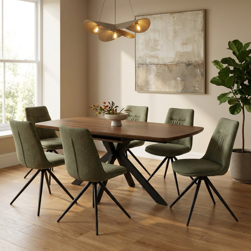 The Boston Extending Table, which ranges from 1400 to 1800mm, showcases an elegant smoked oak veneer, robust metal legs, and a seamless extension mechanism.