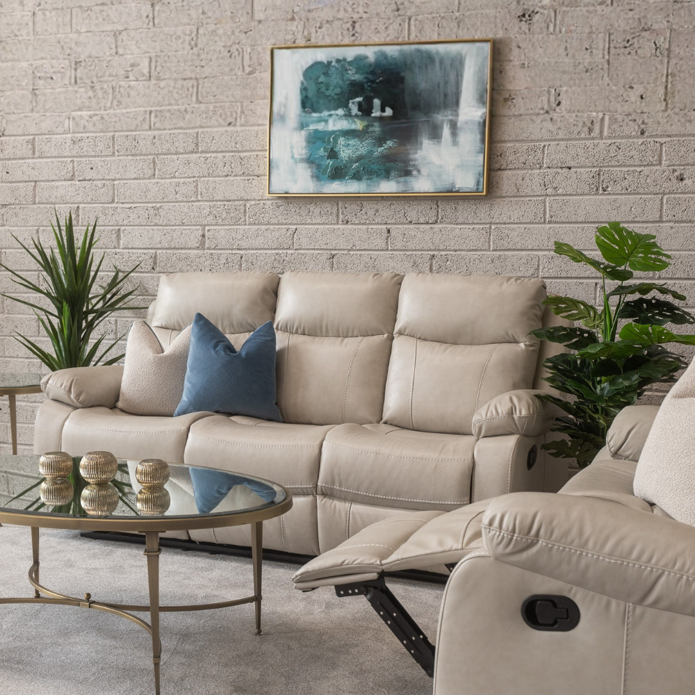 The Brittas Recliner Sofa in Beige Leathaire features padded headrests, armrests, multiple size options & nationwide delivery all over Ireland!