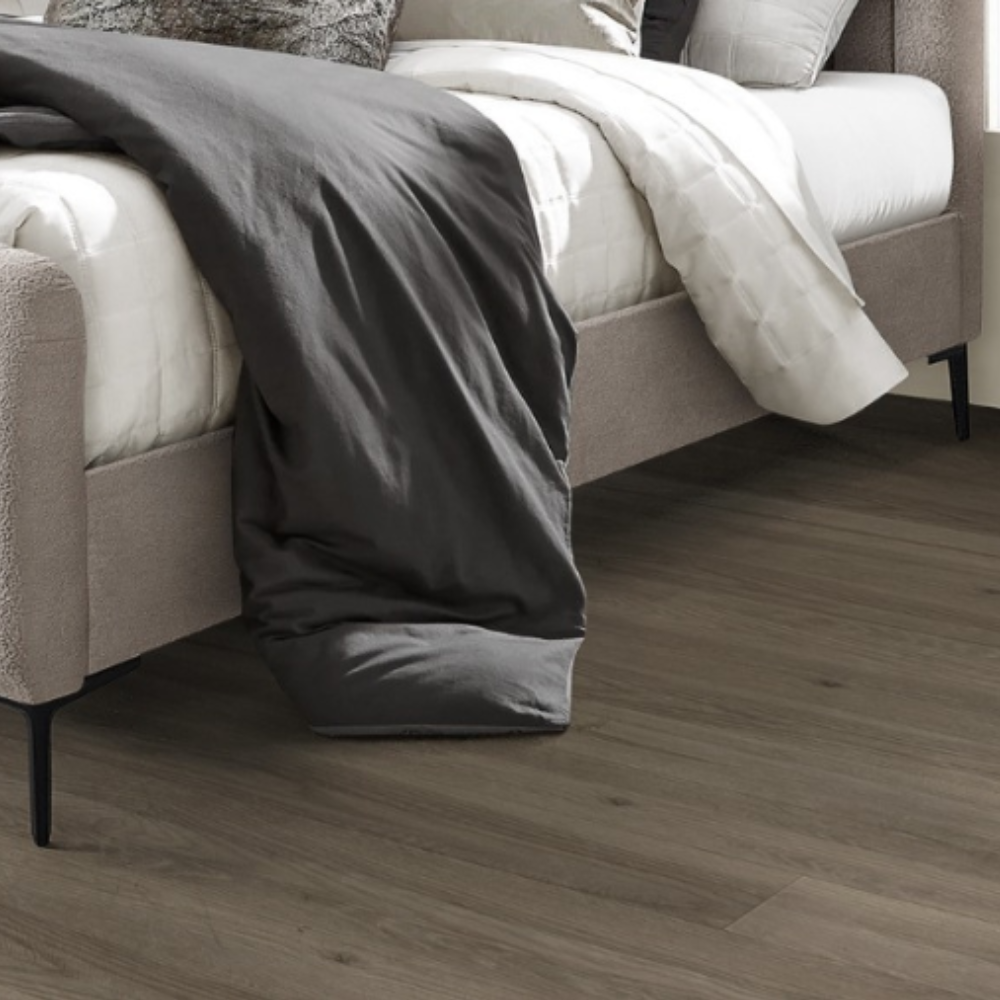 The Clarissa Bed in Grey or Beige features chic channelled upholstery, sturdy metal legs, and padded headboard.