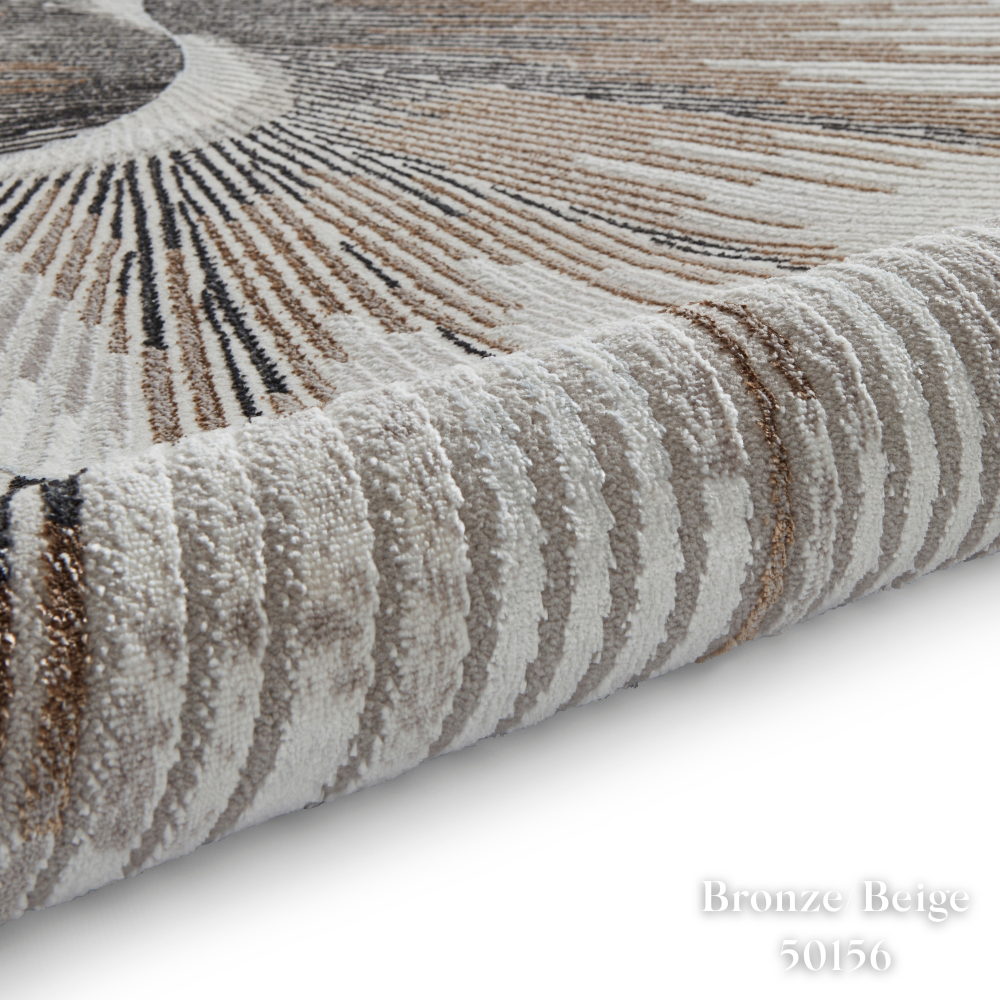 Elevate your style with the Creation Modern Abstract Machine Made Rugs Range featuring metallic yarn, textured piles and artistic pattern.