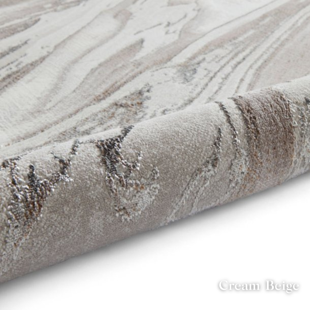 Elevate your style with the Creation Modern Abstract Machine Made Rugs Range featuring metallic yarn, textured piles and artistic pattern.