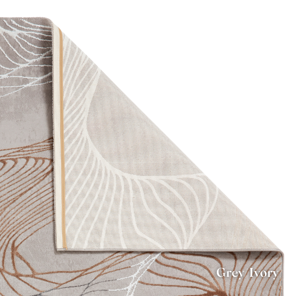 Elevate your style with the Creation Modern Abstract Machine Made Rugs Range featuring metallic yarn, textured piles and artistic pattern.