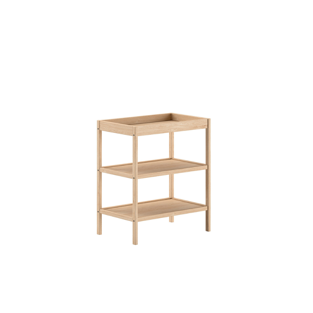 The Dino Baby Changing Table in Natural features a European beech material with open shelves, making it easily accessible for baby essentials