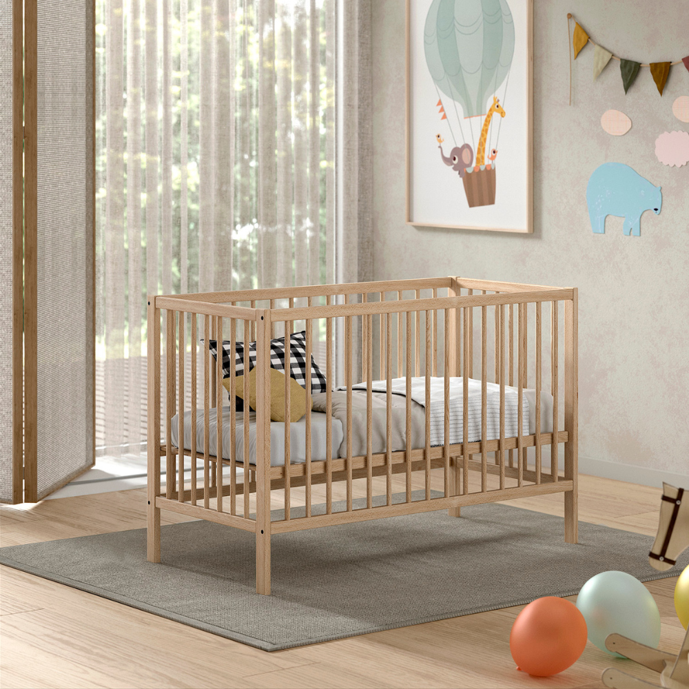 The Dino Baby Cot Bed 60 x 120cm in Natural features a European beech material, smooth lacquered finish and a 3 height adjustable slatted base