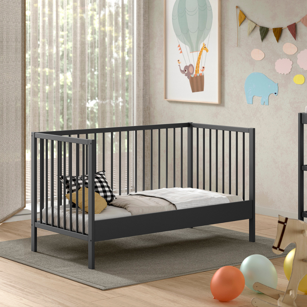The Dino Baby Cot Bed 70 x 140cm in Anthracite features removable bars, 3 height adjustable slat base, European beech material and toddler bed conversion