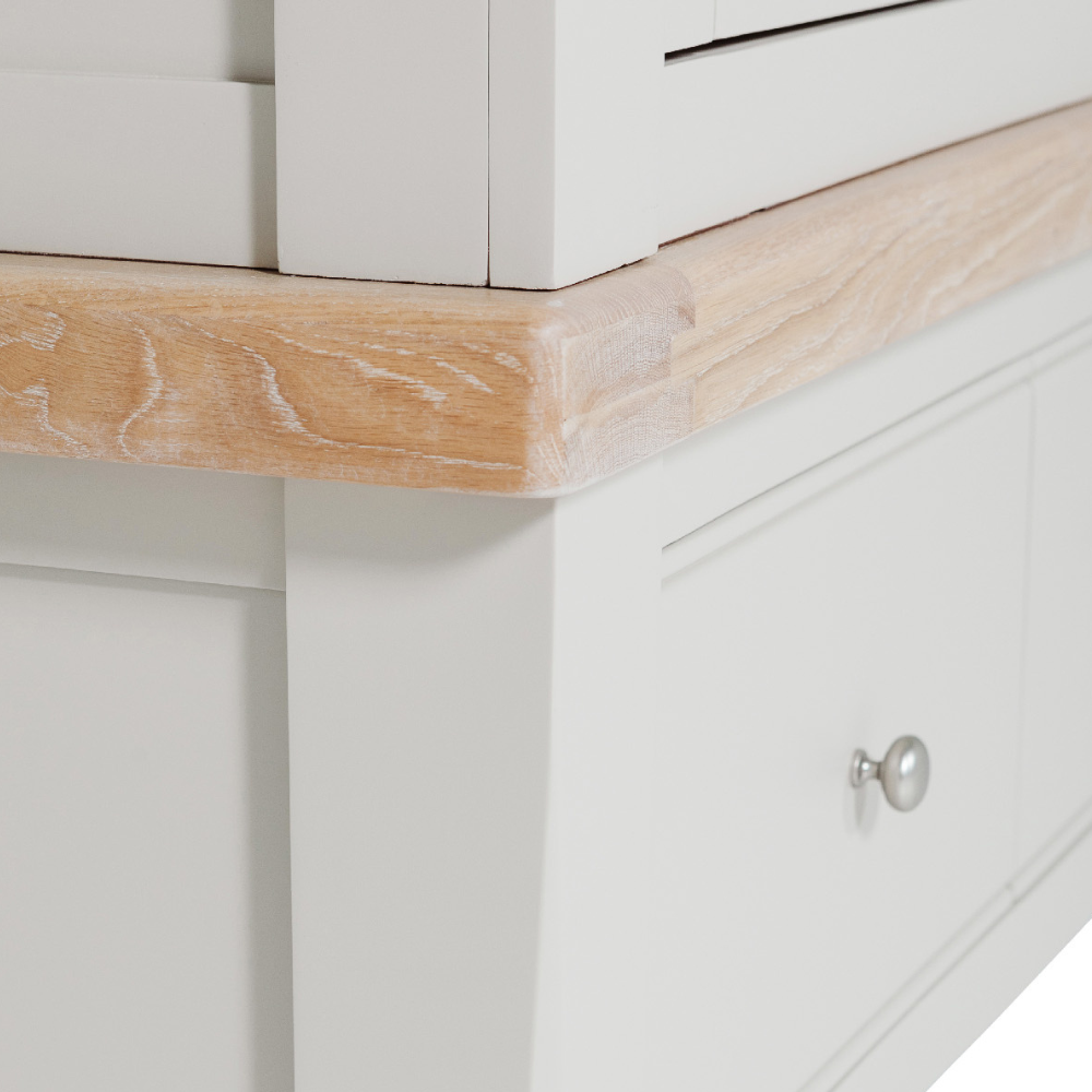 The Doune 3-Door Wardrobe in Taupe offers stylish storage with oak veneer top, hanging rail, shelving and 3 drawers.