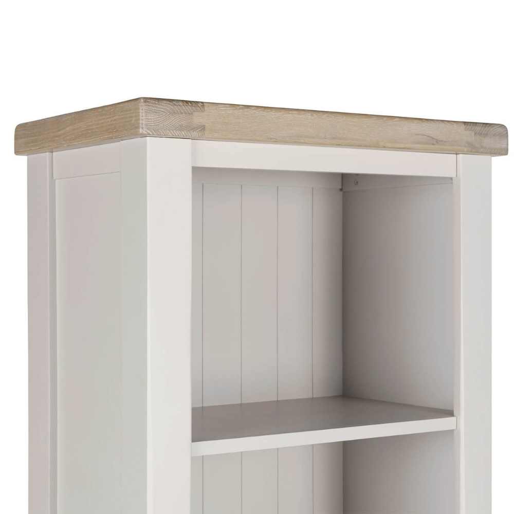 The Doune Tall Bookcase in Taupe features sleek design, oak veneer top and a hidden cabinet storage.
