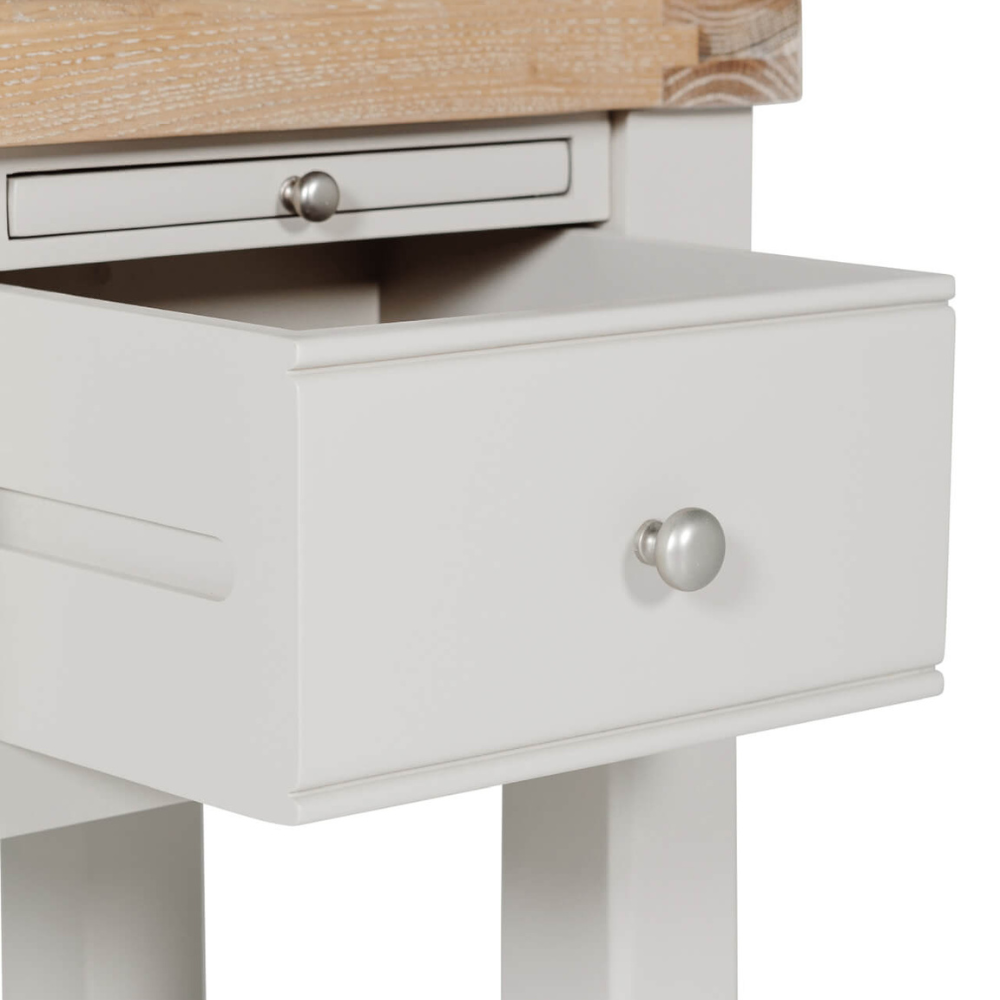 The Doune Table Lamp in Taupe features a refined painted finish. Ideal for lamps, adding elegance and function to any room.
