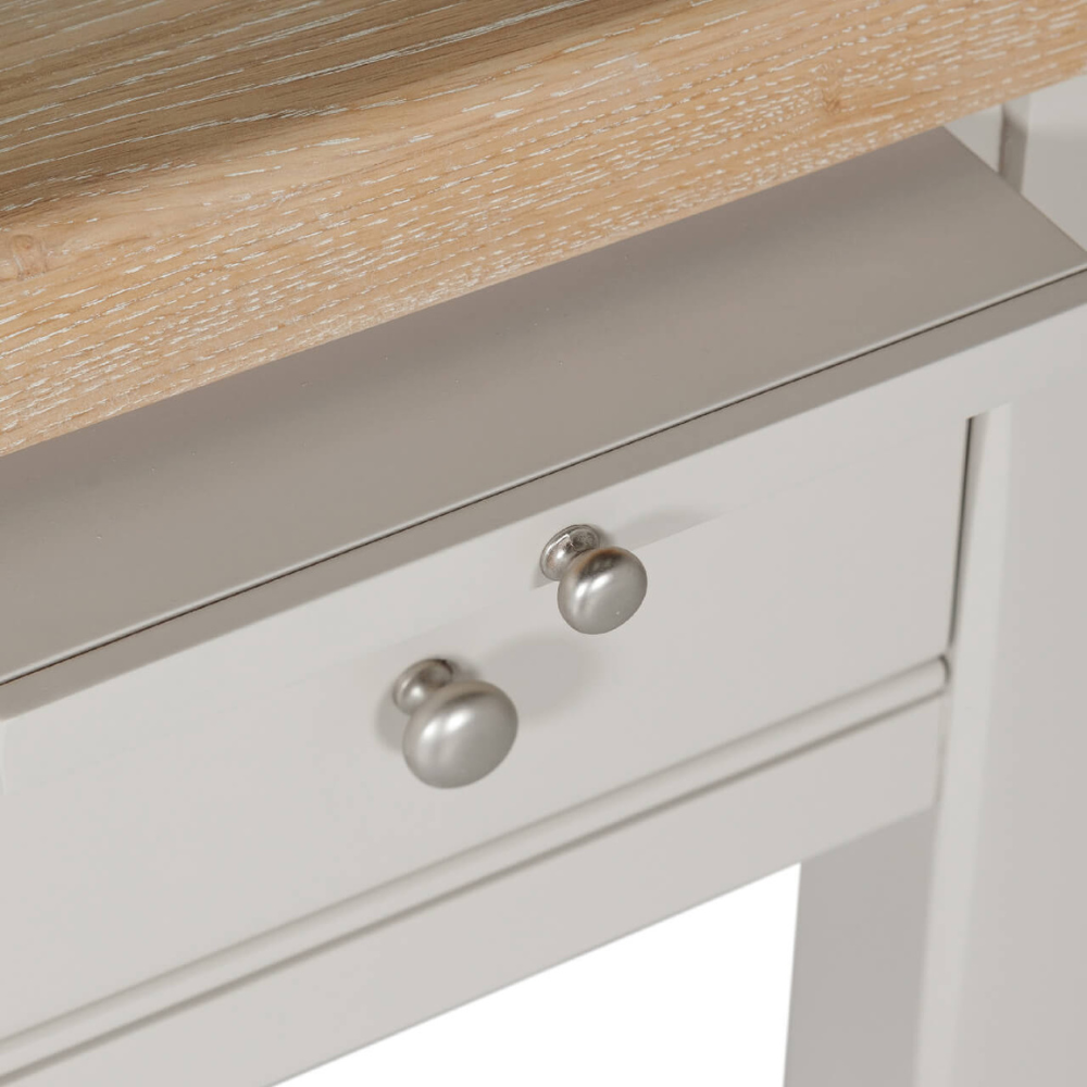 The Doune Table Lamp in Taupe features a refined painted finish. Ideal for lamps, adding elegance and function to any room.