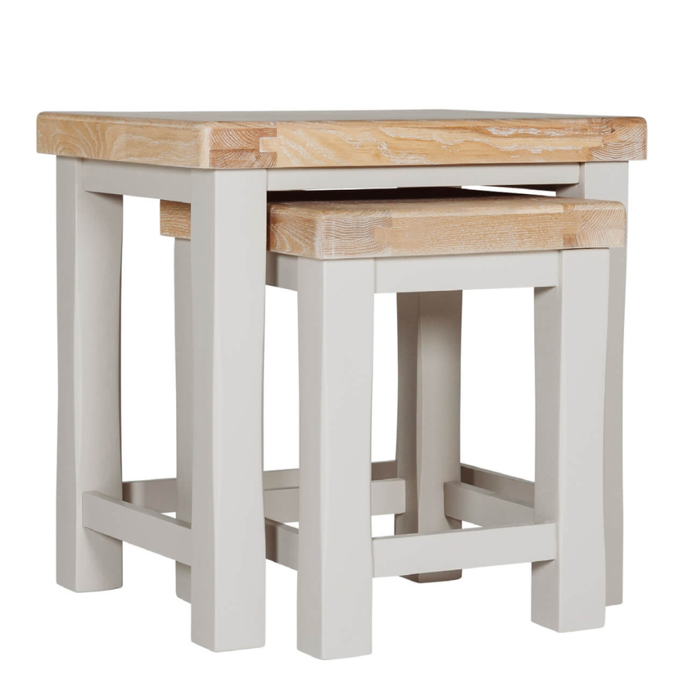The Doune Nest of Tables in Taupe features oak top offers, versatility and painted finish, perfect for adaptable functionality.