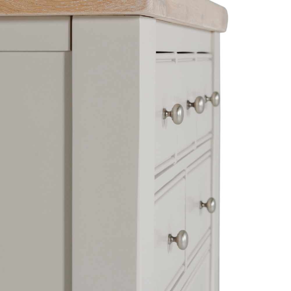The Doune Tall Chest 8 Drawer in Taupe features oak veneer top and metal handles; ample storage with a chic finish.