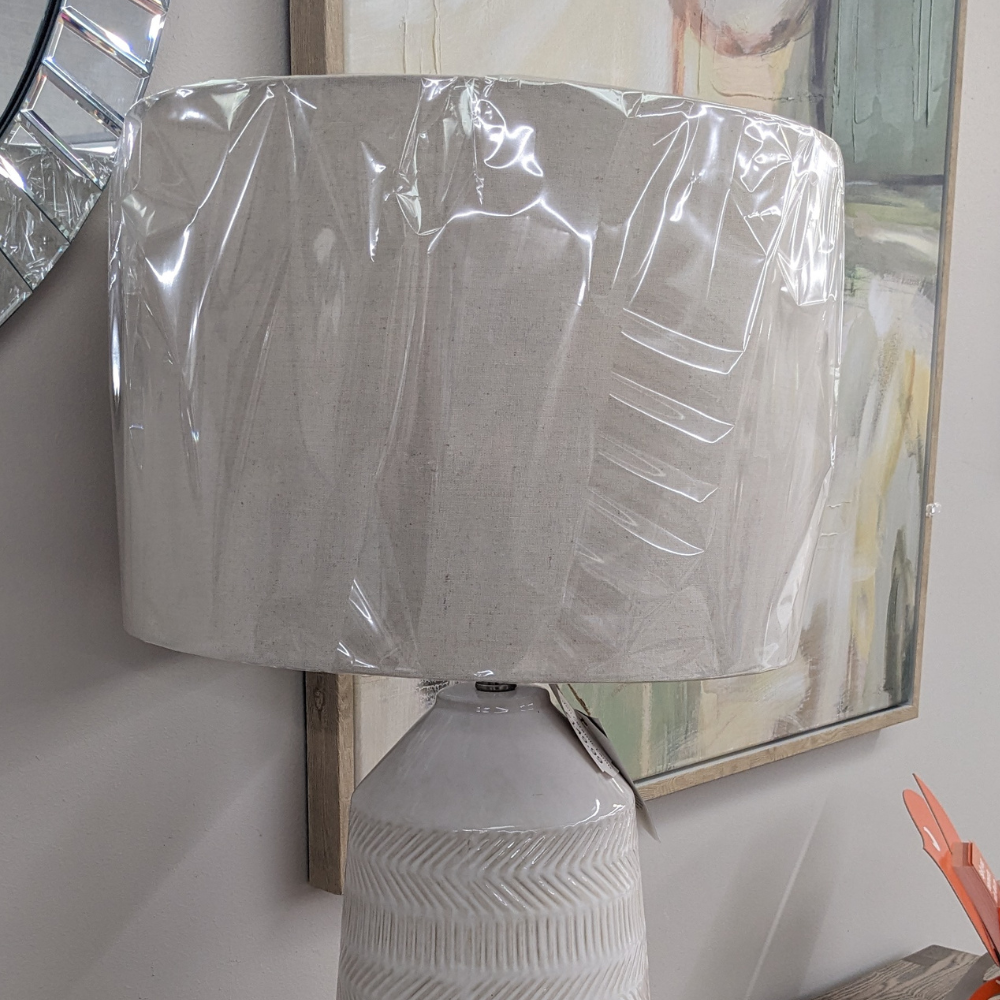 The Eden Ceramic Table Lamp 82cm is a statement lamp with a sleek ceramic finish, modern elegance and versatile style for both modern and classic interiors