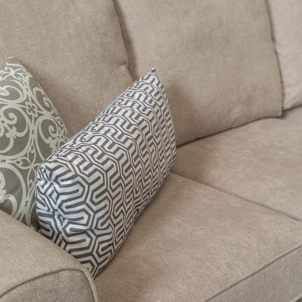 The Ellis Fabric Sofa in Beige combines timeless style and comfort with soft fabric and sturdy wooden leg for long lasting style and durability