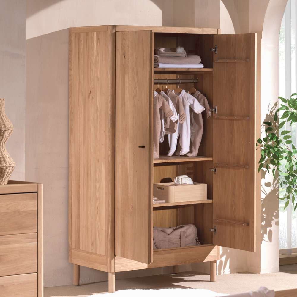 The Forrest Kids 2 Door Wardrobe in Oak features 3 spacious shelves and a hanging rail, soft close on the doors and a natural lacquered finish