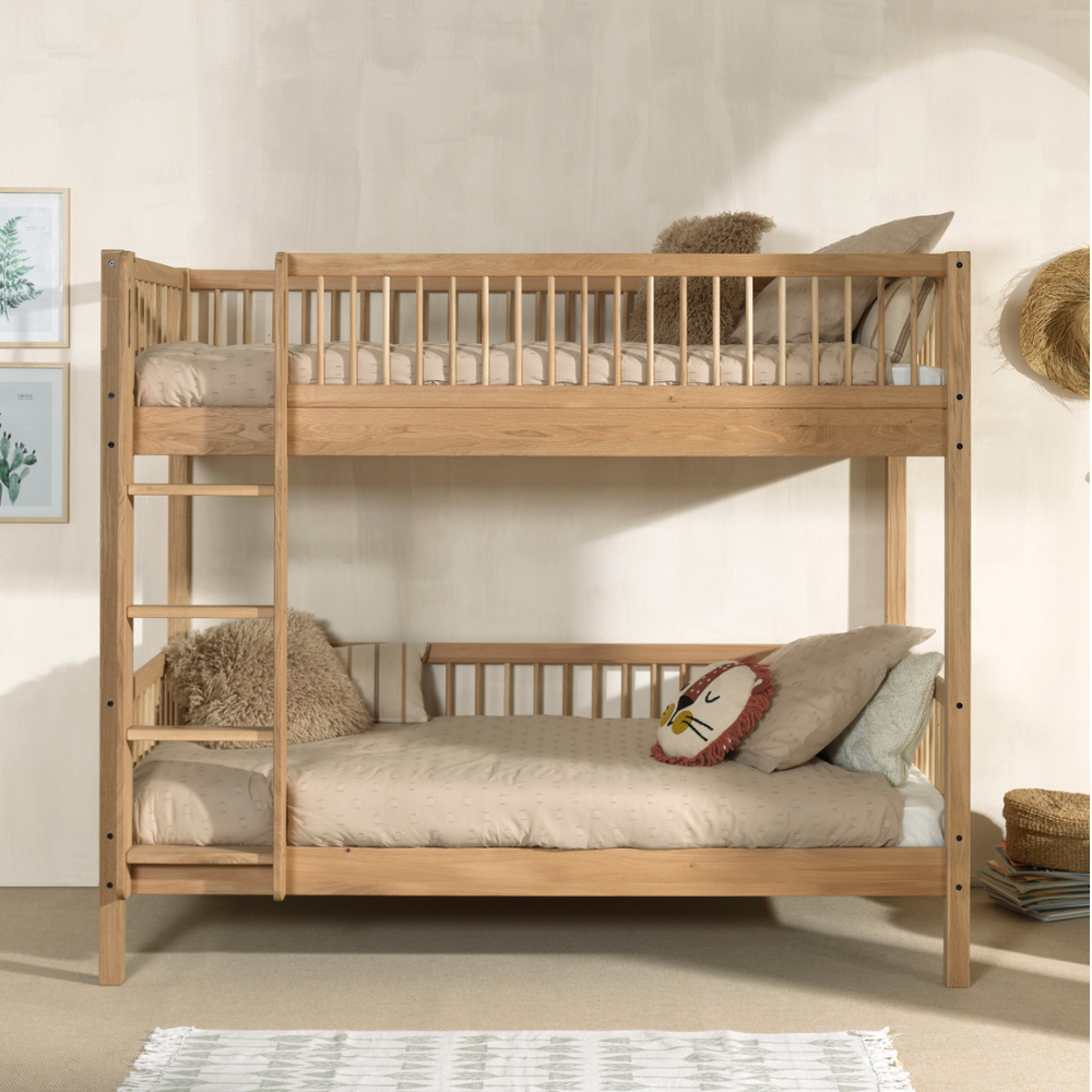 The Forrest Kids Bunk Bed in Oak features a reversible ladder that converts into 2 single beds, a rustic style and durable high quality European oak