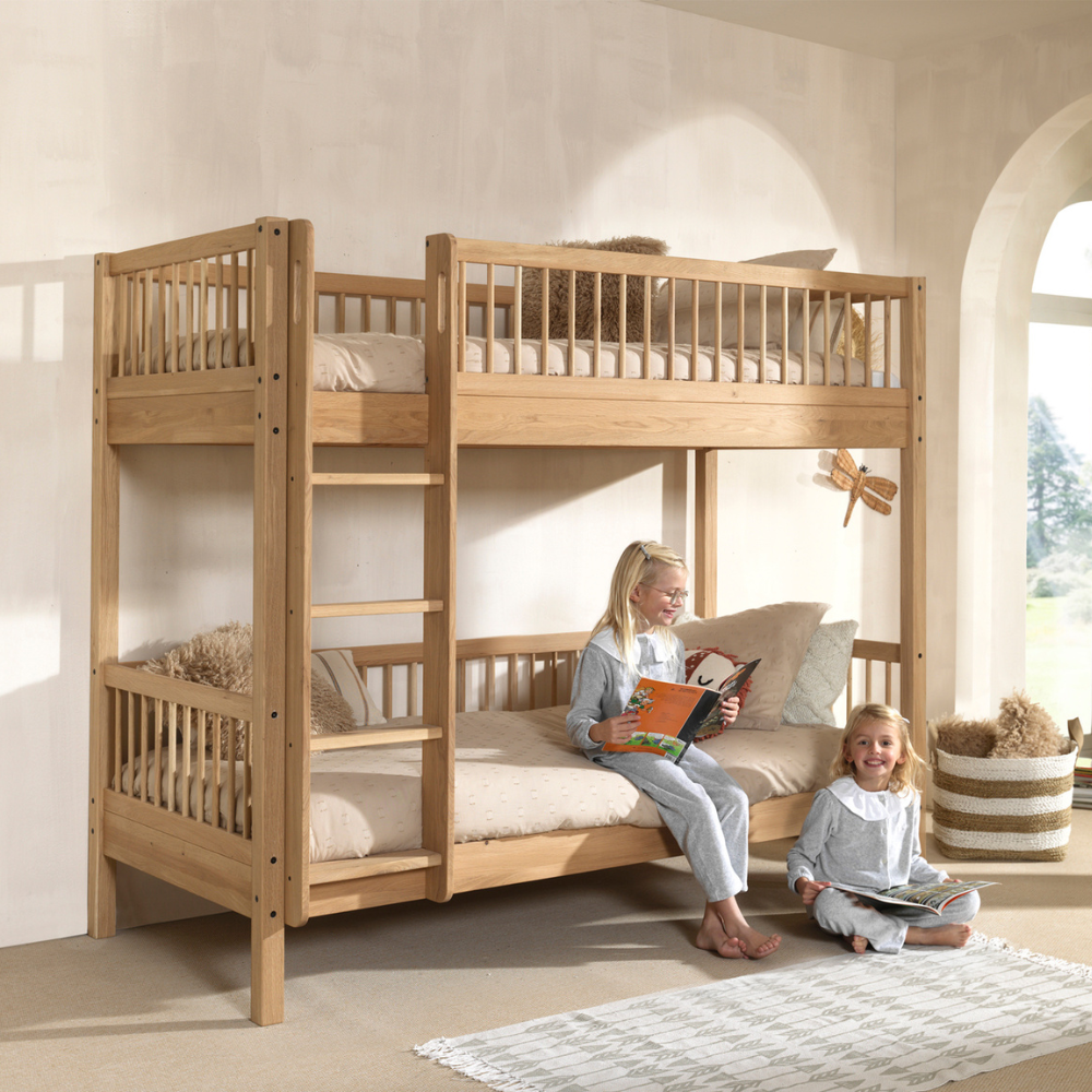 The Forrest Kids Bunk Bed in Oak features a reversible ladder that converts into 2 single beds, a rustic style and durable high quality European oak