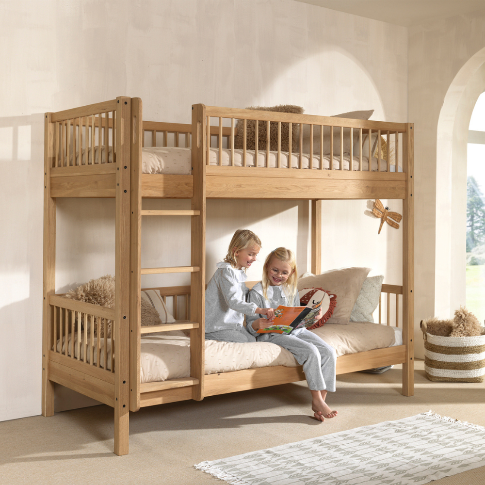 The Forrest Kids Bunk Bed in Oak features a reversible ladder that converts into 2 single beds, a rustic style and durable high quality European oak