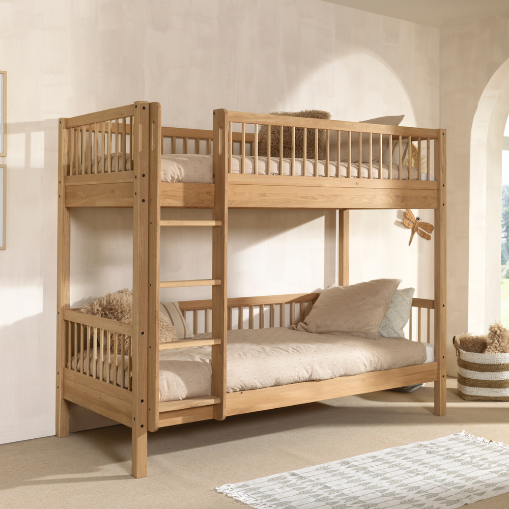 The Forrest Kids Bunk Bed in Oak features a reversible ladder that converts into 2 single beds, a rustic style and durable high quality European oak