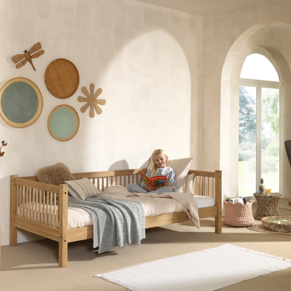 The Forrest Kids Cabin Bed in Oak offers a 3 sided rail, a storage space underneath for necessities and a natural lacquered finish in a rustic style