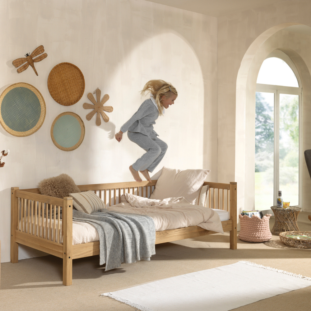 The Forrest Kids Cabin Bed in Oak offers a 3 sided rail, a storage space underneath for necessities and a natural lacquered finish in a rustic style