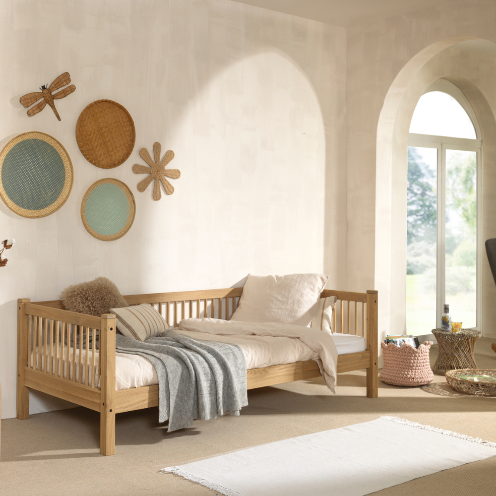 The Forrest Kids Cabin Bed in Oak offers a 3 sided rail, a storage space underneath for necessities and a natural lacquered finish in a rustic style