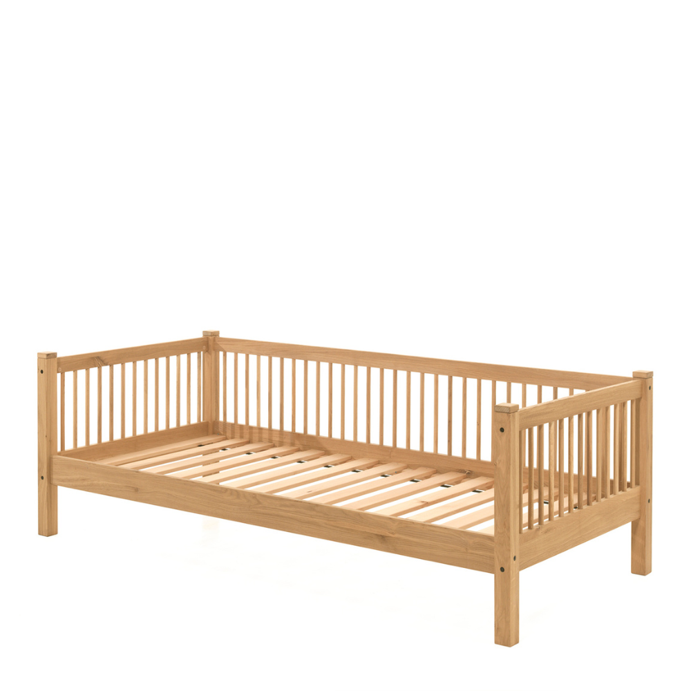 The Forrest Kids House Bed in Oak offers a 3 sided rail, removable roof, a natural lacquered finish in a rustic style and convertible into a cabin bed